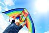 Boy launching a kite