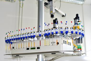 Autosampler of NMR spectrometer loaded with samples for analysis. Institute of Organic and Biochemistry Academy of Sciences the Czech Republic