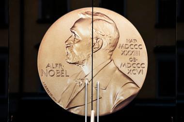 An image showing a set of doors engraved with the Nobel medal