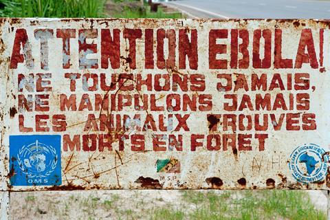 MAKOUA, CONGO, AFRICA - SEPTEMBER 27: A sign warns visitors that area is a Ebola infected. Signage informing visitors that it is a ebola infected area. September 27, 2013,Congo, Africa.