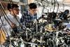 Zhendong Zhang (left) and Cheng Chin in the laboratory