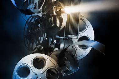 Cover image for Onscreen Chemistry RSC book showing films reels and projector on a dark background