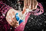 A can of fizzy drink bursting open